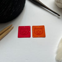 1.5” square ultrasuede tag, sleeping bear