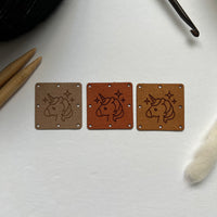 1.5” square ultrasuede tag, unicorn