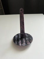 Black and silver yarn cake spinner