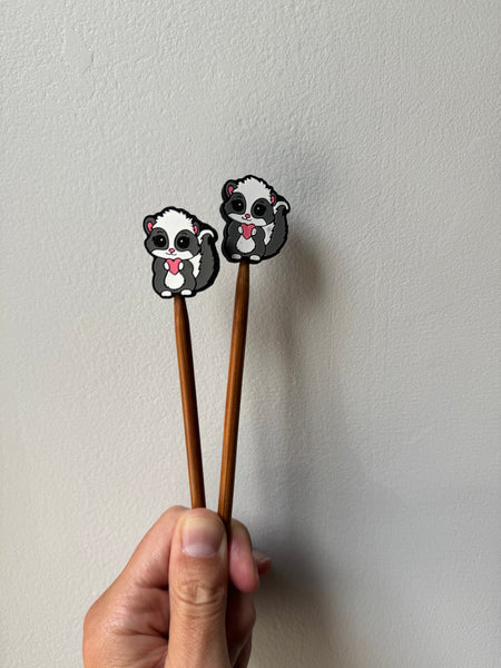 skunk needle stoppers