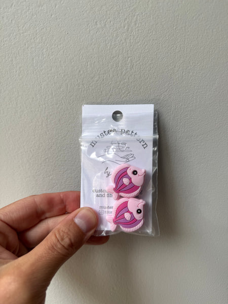Pink fish needle stoppers