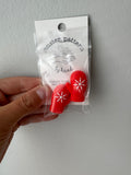 Snowflake mitten needle stoppers
