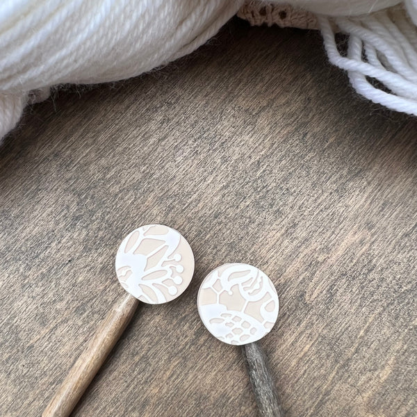 Lace round needle protectors