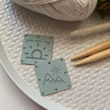 1.5” square ultrasuede tags